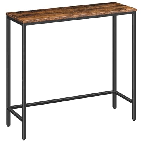 An entryway console table with decor and a mirror