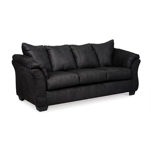 A modern sofa in a warm neutral living room