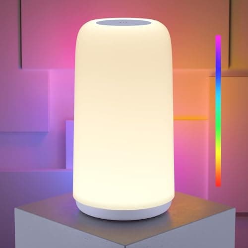 A table lamp casting warm light on a side table