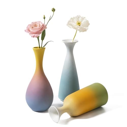 Ceramic vases styled on a shelf