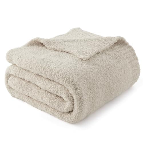 Textured throw pillows arranged on a sofa