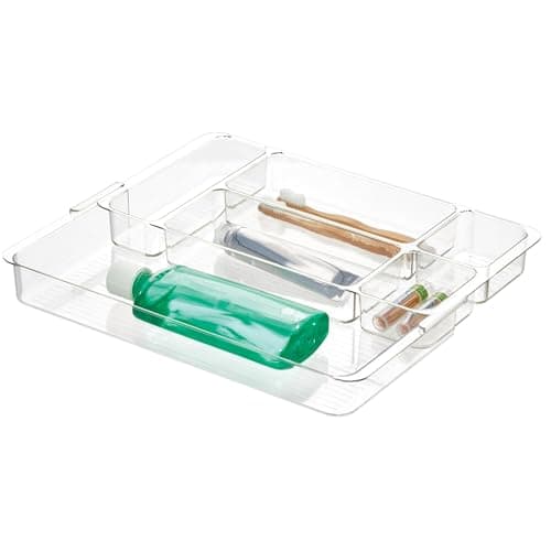 An organized closet with storage bins and baskets