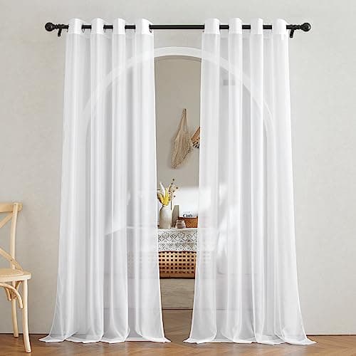 Linen curtains framing a sunlit window