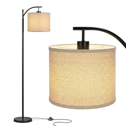 A table lamp casting warm light on a side table