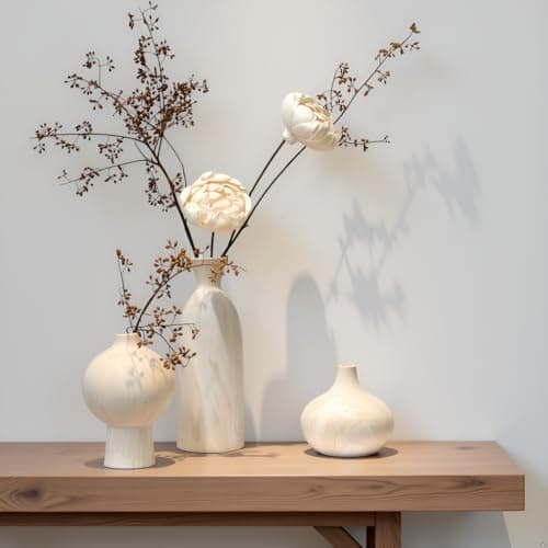 Ceramic vases styled on a shelf