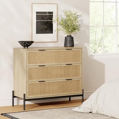 A wood dresser styled in a bedroom