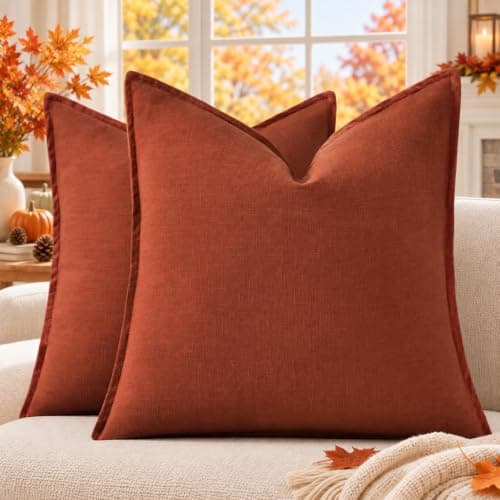 Textured throw pillows arranged on a sofa