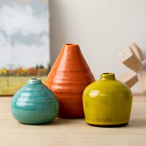 Ceramic vases styled on a shelf