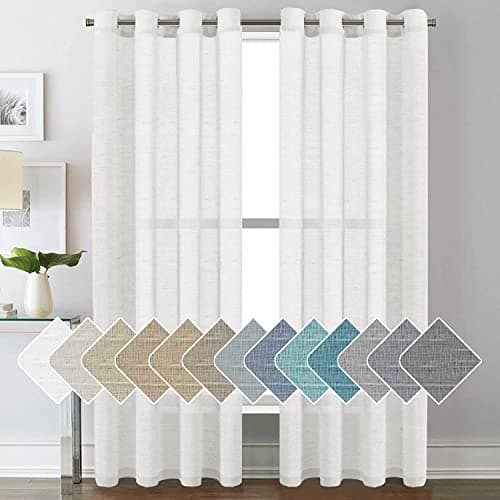 Linen curtains framing a sunlit window