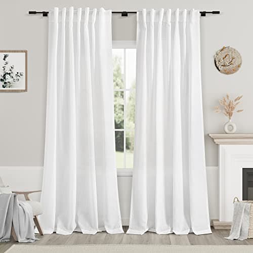 Linen curtains framing a sunlit window
