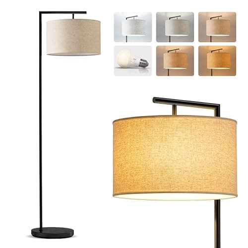 A table lamp casting warm light on a side table