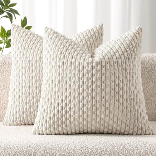 Textured throw pillows arranged on a sofa