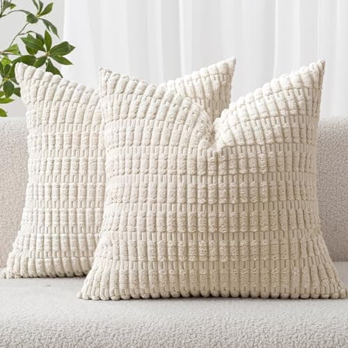 Textured throw pillows arranged on a sofa