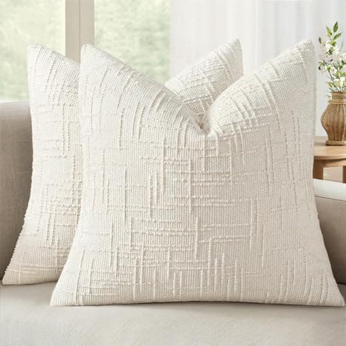 Textured throw pillows arranged on a sofa