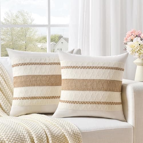 Textured throw pillows arranged on a sofa