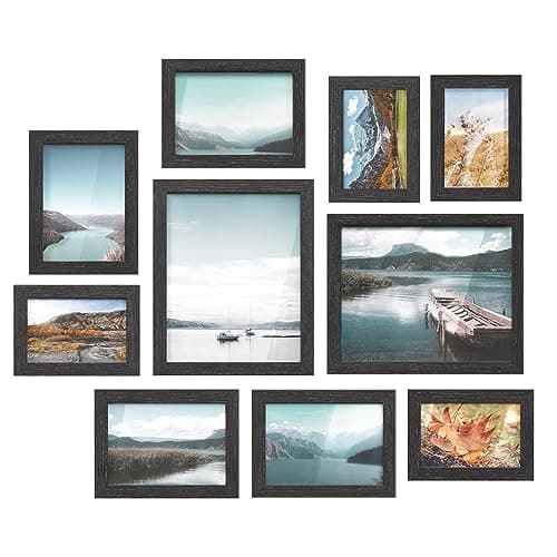 A gallery wall of framed art above a sofa