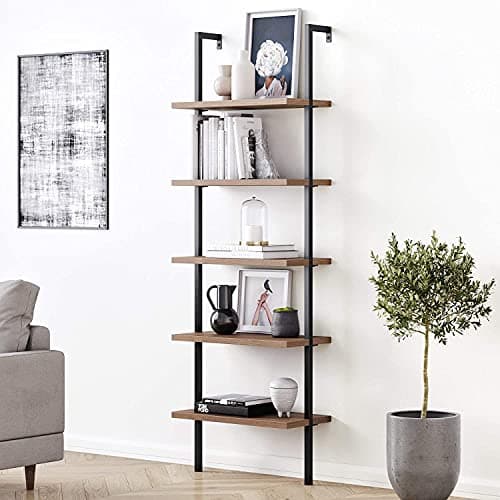 A styled bookshelf with books and decor
