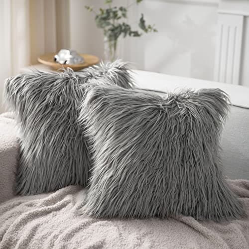 Textured throw pillows arranged on a sofa