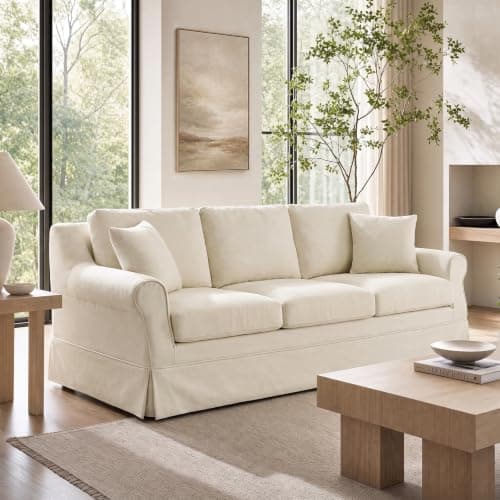 A modern sofa in a warm neutral living room