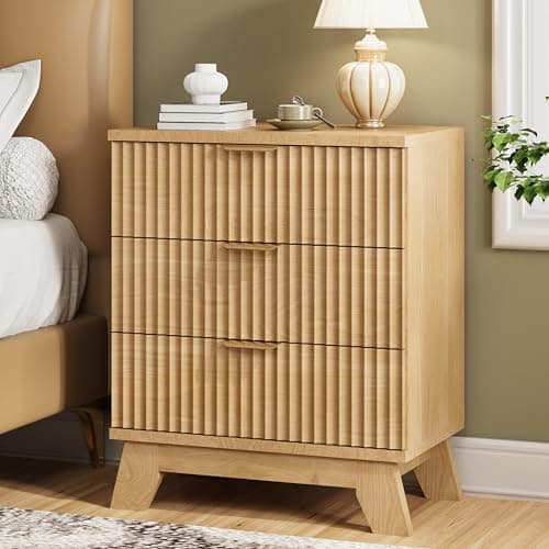 A nightstand with a bedside lamp and decor