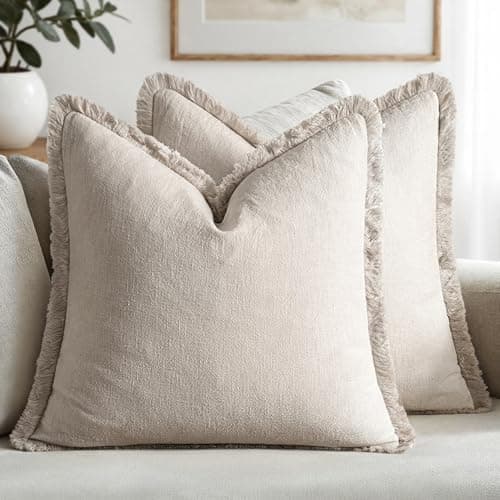 Textured throw pillows arranged on a sofa