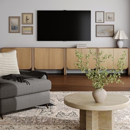 A styled wood coffee table in a living room