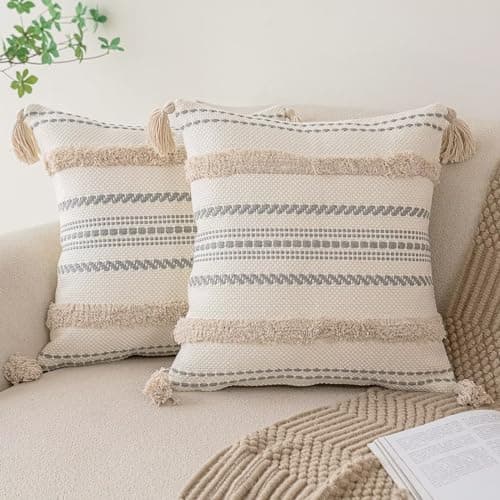 Textured throw pillows arranged on a sofa