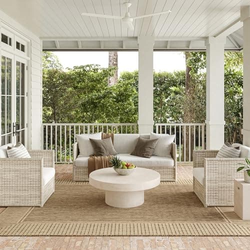 A textured area rug anchoring a living room