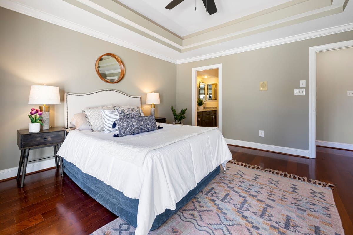 A warm, decorated bedroom