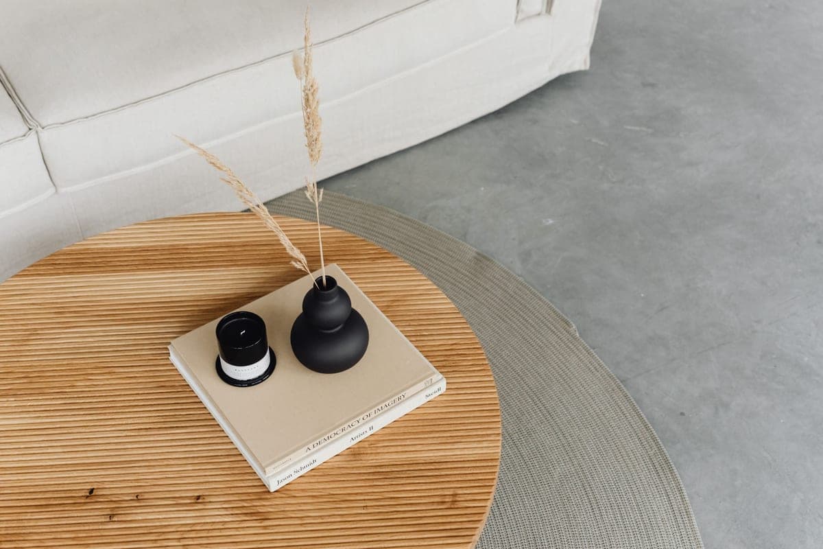 A styled wood coffee table in a living room