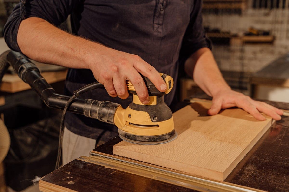 Applying wax to a wood furniture finish