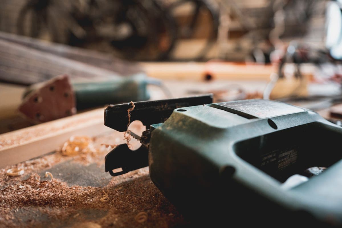 A renovation workshop with tools and a workbench