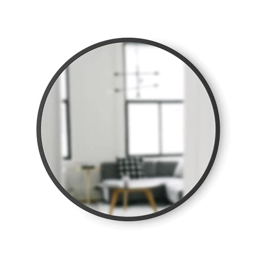 A welcoming entryway with a console and mirror