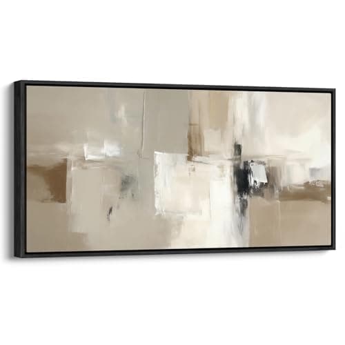 A gallery wall of framed art above a sofa