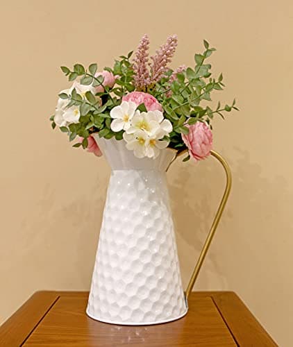Ceramic vases styled on a shelf