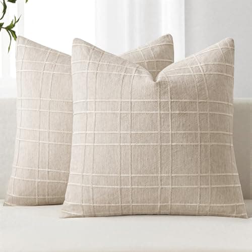 Textured throw pillows arranged on a sofa