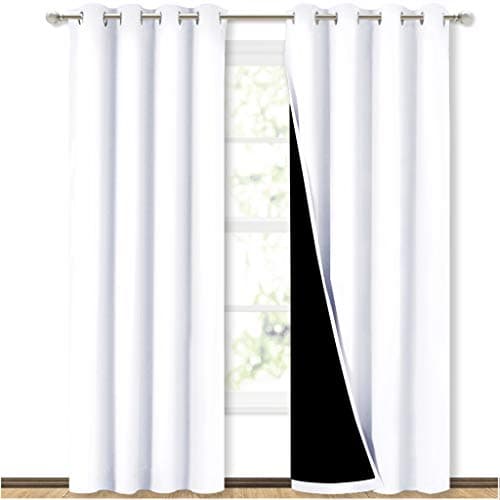 Linen curtains framing a sunlit window