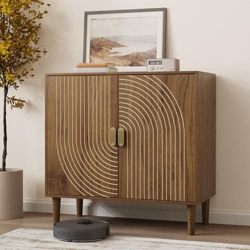 A wood dresser styled in a bedroom