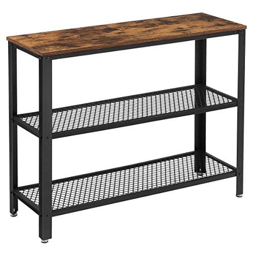 An entryway console table with decor and a mirror