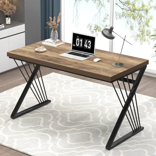 A home-office desk and chair in a warm workspace