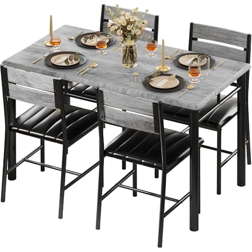 A dining table and chairs in a warm interior