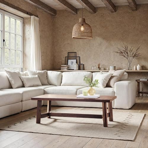 A styled wood coffee table in a living room