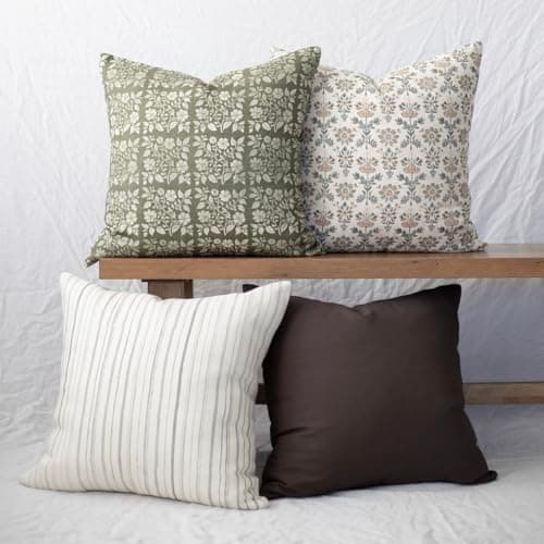 A modern sofa in a warm neutral living room